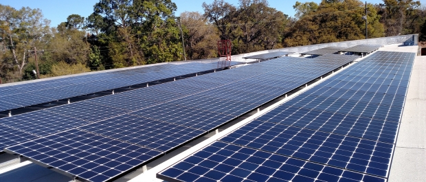 Large open area with 8+ long Solar Panels, tilted to the sun.
